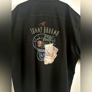 Men’s silk short sleeve Tommy Bahama shirt. Hand embroidered stitching on back.